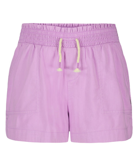 The Roxy Girls' Soleil Short features light purple brushed twill, a smocked elastic waistband with cream drawstring, and two front pockets, shown against a white background.